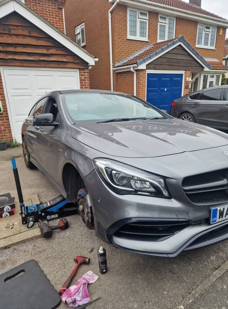 Mercedes CLA brake service on driveway
